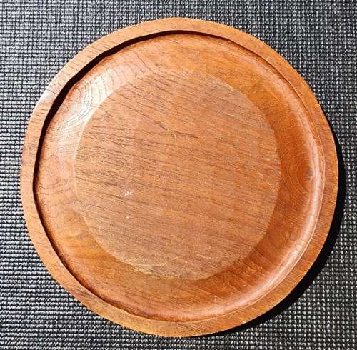 ORIENTAL TEAK COFFEE TABLE  CIRCULAR TOP WITH CARVED FLORAL BORDER AND FOLDING TRIPOD FEET