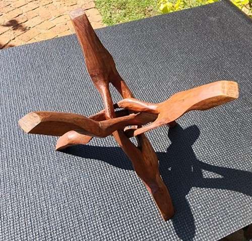 ORIENTAL TEAK COFFEE TABLE  CIRCULAR TOP WITH CARVED FLORAL BORDER AND FOLDING TRIPOD FEET