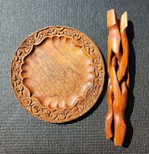 ORIENTAL TEAK COFFEE TABLE  CIRCULAR TOP WITH CARVED FLORAL BORDER AND FOLDING TRIPOD FEET