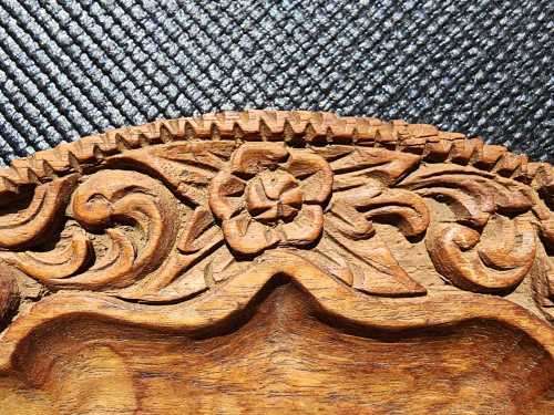 ORIENTAL TEAK COFFEE TABLE  CIRCULAR TOP WITH CARVED FLORAL BORDER AND FOLDING TRIPOD FEET