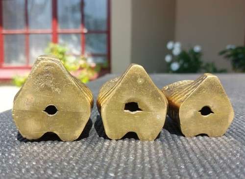A FAMILY OF BRASS OWLS