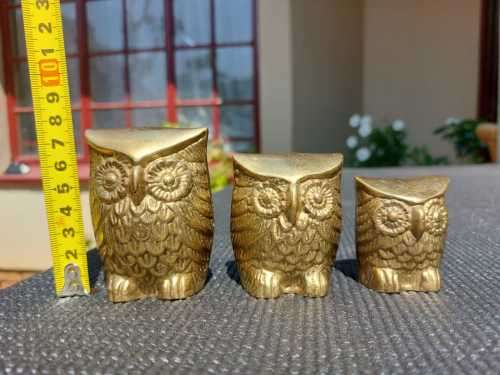 A FAMILY OF BRASS OWLS