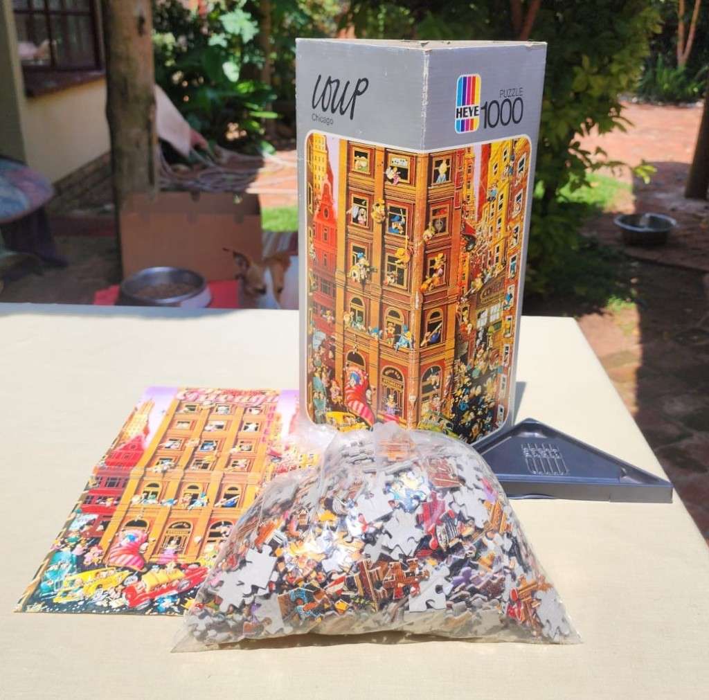 COLLECTABLE 1974 FRIEDRICH HEYE GERMANY 1000 PIECE PUZZLE TITLED CHICAGO BY CARTOON ARTIST JJ LOUP