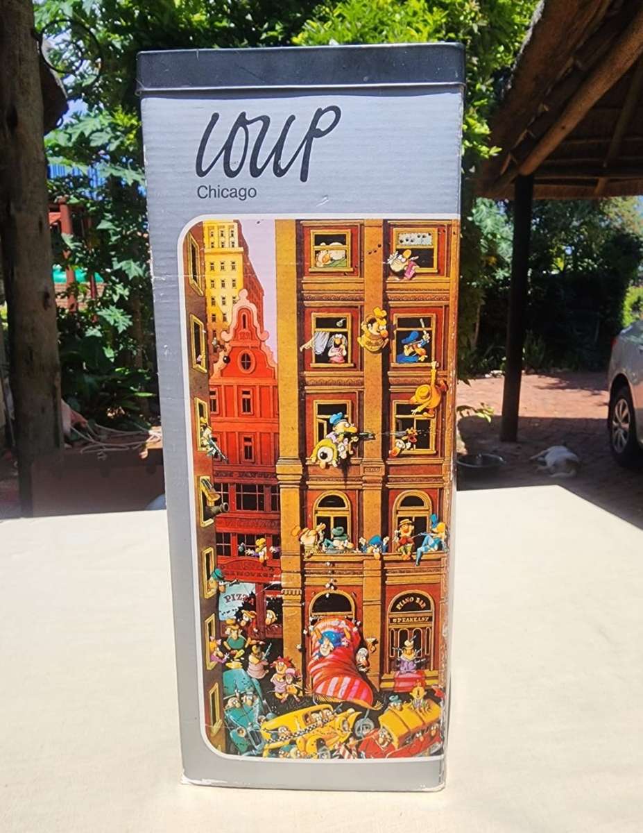 COLLECTABLE 1974 FRIEDRICH HEYE GERMANY 1000 PIECE PUZZLE TITLED CHICAGO BY CARTOON ARTIST JJ LOUP