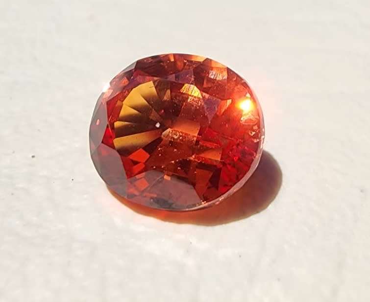 VIVID FIRE ORANGE 3.80CT SAPPHIRE GEMSTONE WITH LOVELY OVAL CUT  UV RED!  THERMAL HIGH!