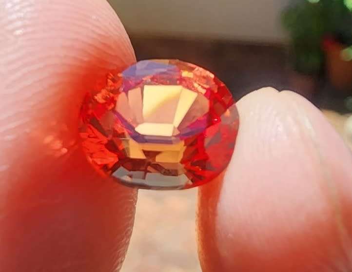 VIVID FIRE ORANGE 3.80CT SAPPHIRE GEMSTONE WITH LOVELY OVAL CUT  UV RED!  THERMAL HIGH!