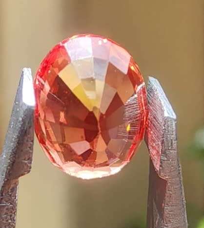 FIRE ORANGE 1.45CT SAPPHIRE GEMSTONE WITH LOVELY OVAL CUT  UV RED!  THERMAL HIGH
