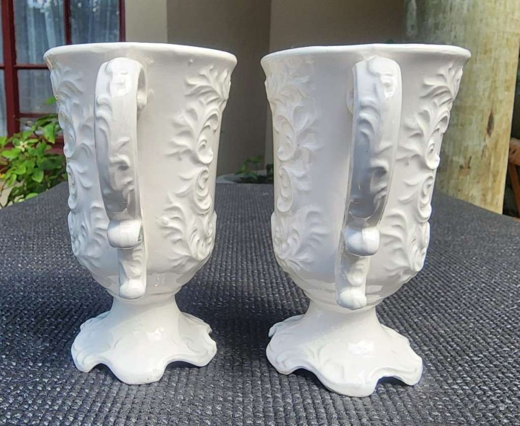 PAIR OF BALBOA HANDMADE CERAMIC CHALICES WITH RAISED FOILAGE AND FLOWER DESIGN