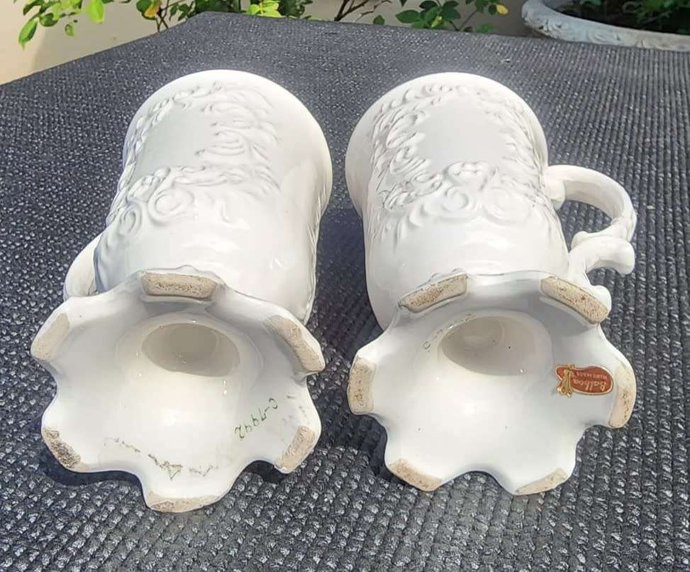PAIR OF BALBOA HANDMADE CERAMIC CHALICES WITH RAISED FOILAGE AND FLOWER DESIGN