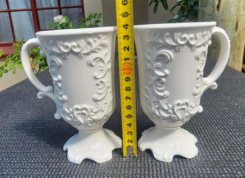 PAIR OF BALBOA HANDMADE CERAMIC CHALICES WITH RAISED FOILAGE AND FLOWER DESIGN