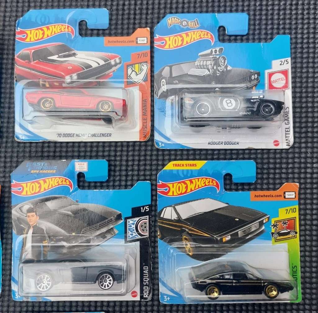 HOTWHEELS COLLECTION OF 12 DIECASTS IN ORIGINAL PACKAGING EARLY 2000 TO 2017 MODELS