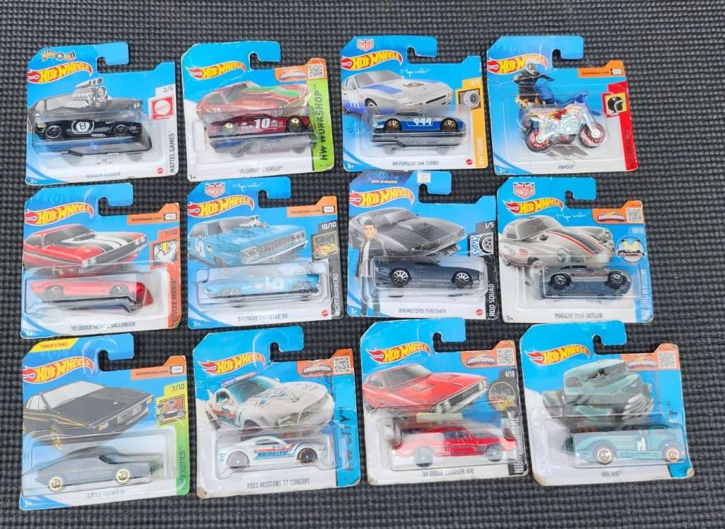 HOTWHEELS COLLECTION OF 12 DIECASTS IN ORIGINAL PACKAGING EARLY 2000 TO 2017 MODELS