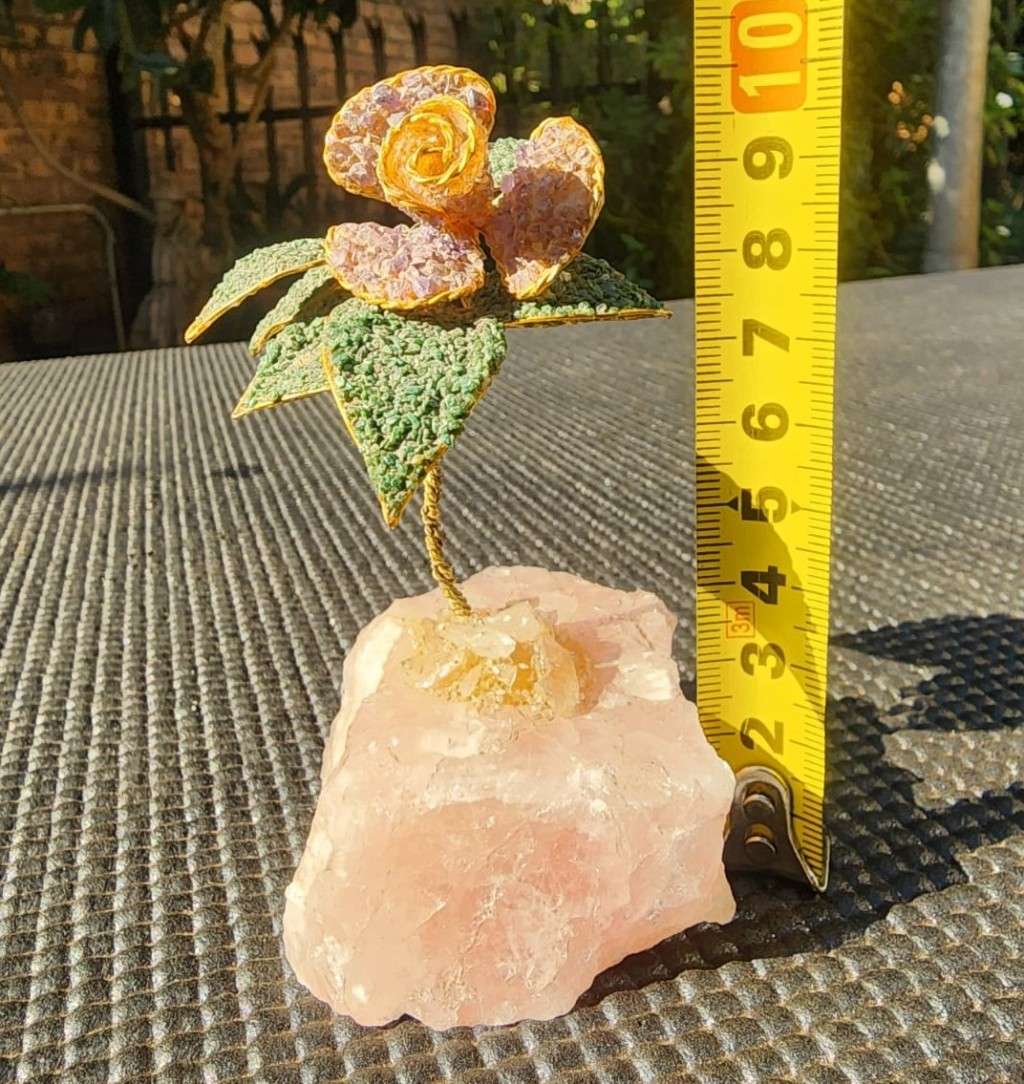 Aventurine and Rhodonite Gravel Flower with Brass Stem on Rose Quartz Slab