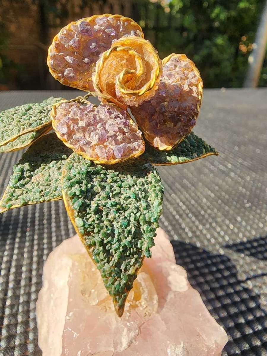 Aventurine and Rhodonite Gravel Flower with Brass Stem on Rose Quartz Slab
