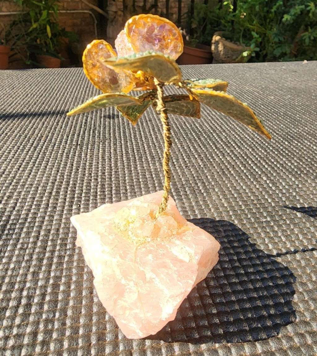 Aventurine and Rhodonite Gravel Flower with Brass Stem on Rose Quartz Slab