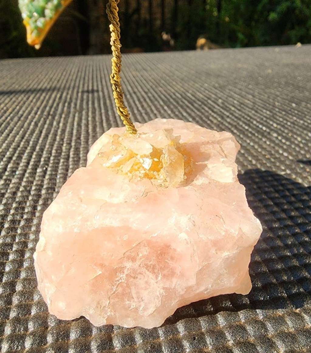 Aventurine and Rhodonite Gravel Flower with Brass Stem on Rose Quartz Slab