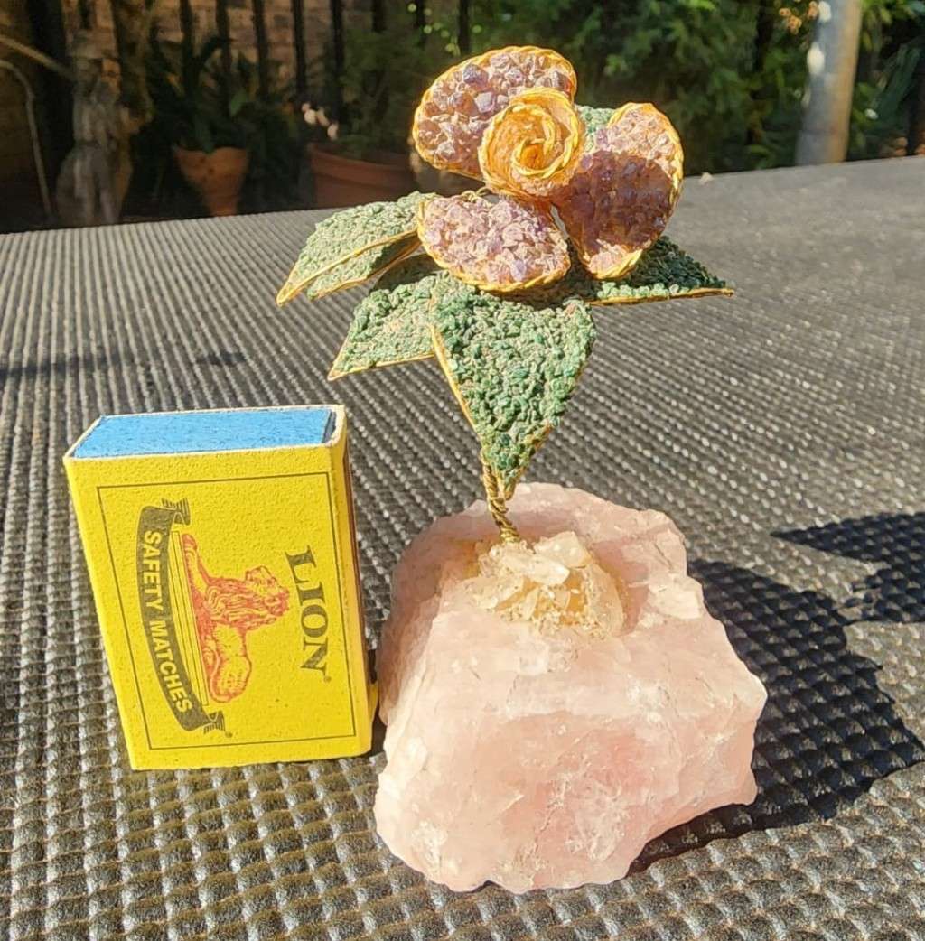 Aventurine and Rhodonite Gravel Flower with Brass Stem on Rose Quartz Slab