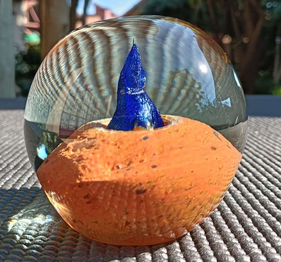 Fascinating Desert Island Glass Paperweight