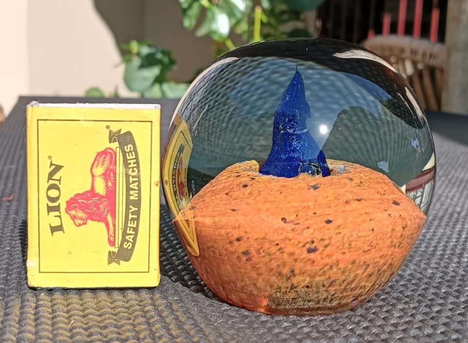 Fascinating Desert Island Glass Paperweight