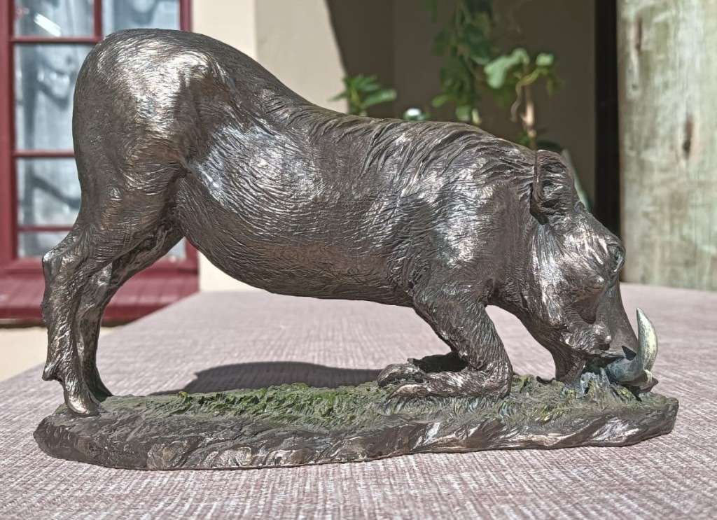 Kneeling Cold Cast Bronze African Warthog Sculpture 19cm Long by Zawadi Knysna South Africa