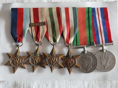 British group of 6:39/45 Star, Africa Star, 8th army bar, Italy Star, France Germany Star, DM, WM