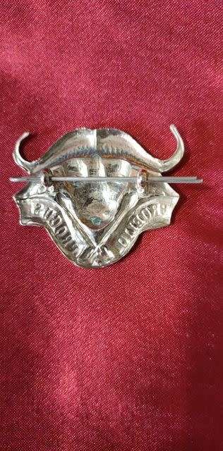 32 beret badge