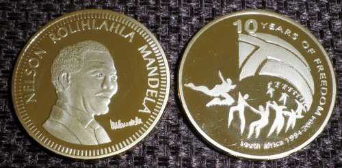 NELSON MANDELA 10 YEARS OF FREEDOM GOLD PLATED BRASS