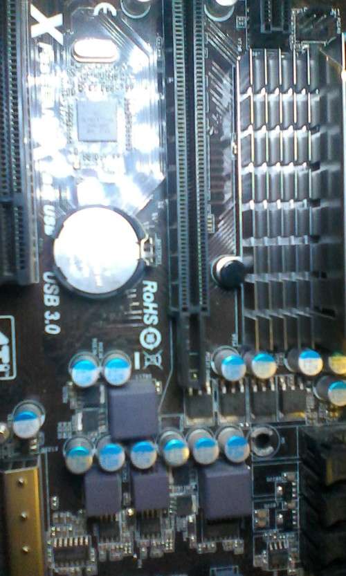 ASRock 990FX Extreme3 + AMD Phenom II X6 1075T
