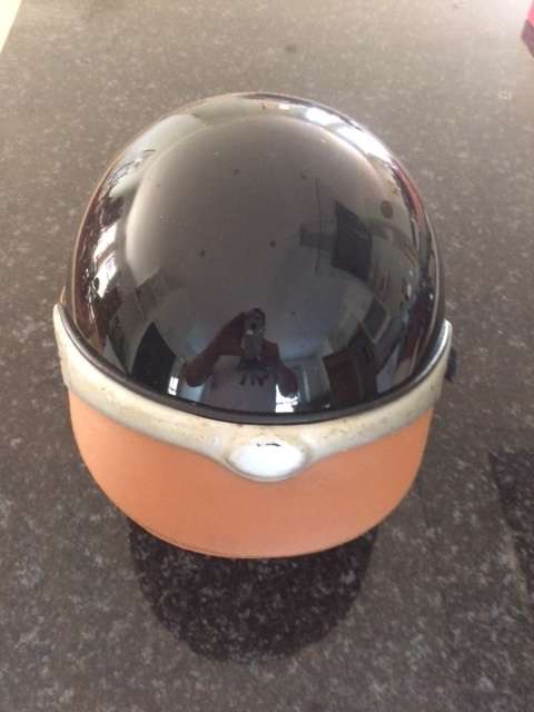 Vespa branded crash helmet. Made in Italy. Medium size.
