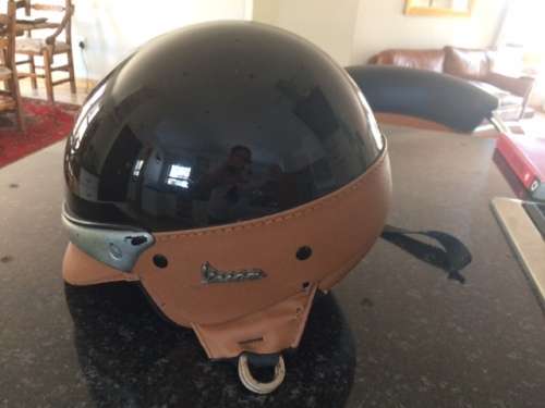 Vespa branded crash helmet. Made in Italy. Medium size.