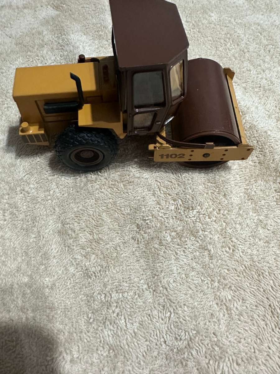 DIECAST CASE COMPACTOR ROLLER