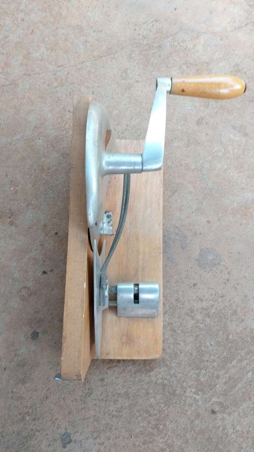 Very old wooden bread slicer