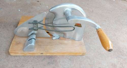 Very old wooden bread slicer