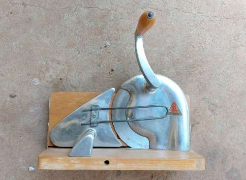 Very old wooden bread slicer