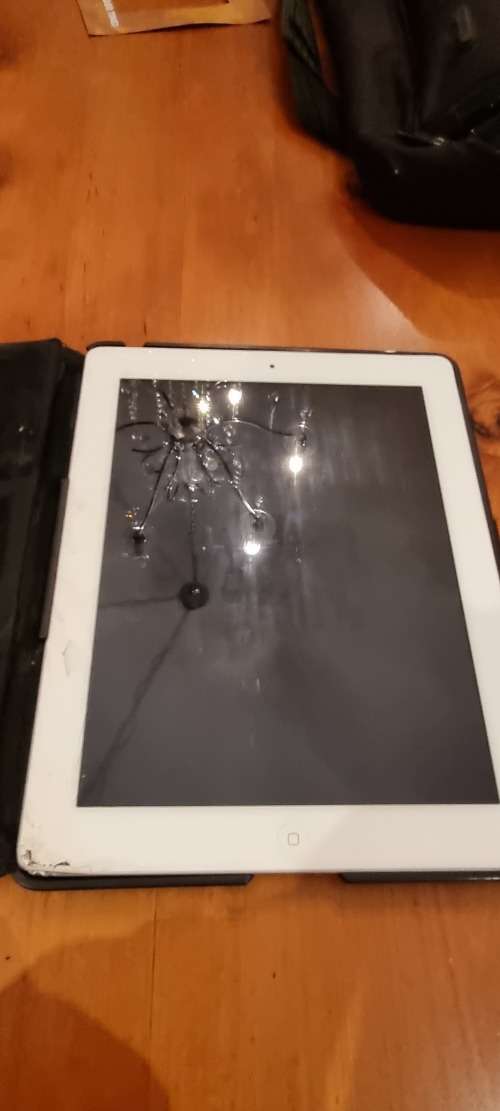 iPhone 5 and 30 pin iPad works needs repair see pictures AS IS