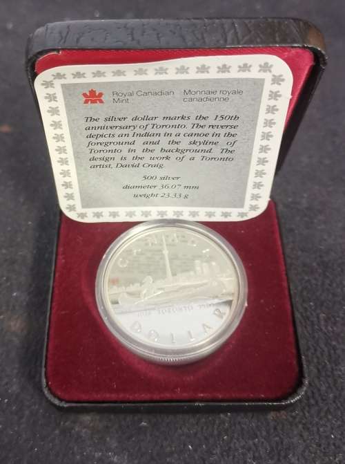 ROYAL CANADIAN MINT - SILVER DOLLAR