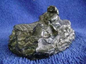 Hand crafted: Fisherman in kajak - Wolf sculptures style