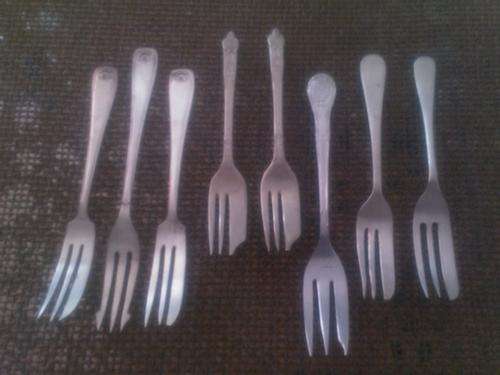 Collection of 8 cake forks