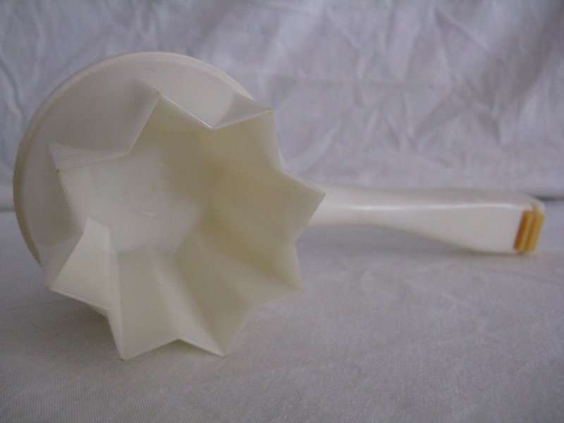 TUPPERWARE COOKIE CUTTER MADE IN THE USA.