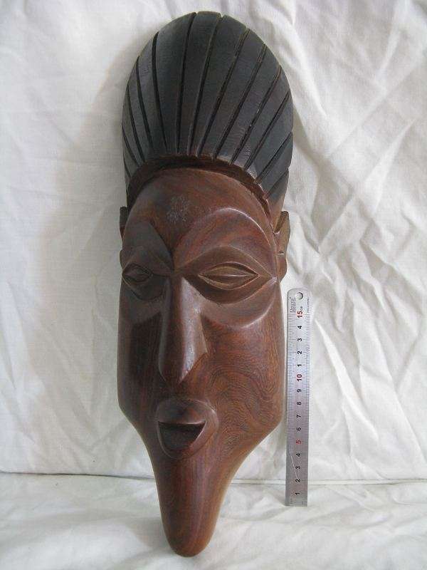 SOLID CARVED WOOD MASK.