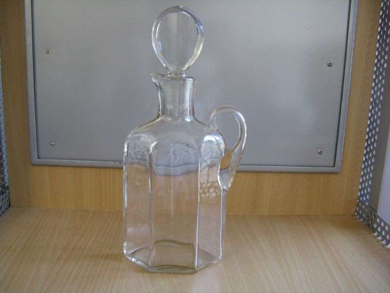 GLASS DECANTER. H (INCLUDING CAP) 27cm. P&P=R33.(CR16)