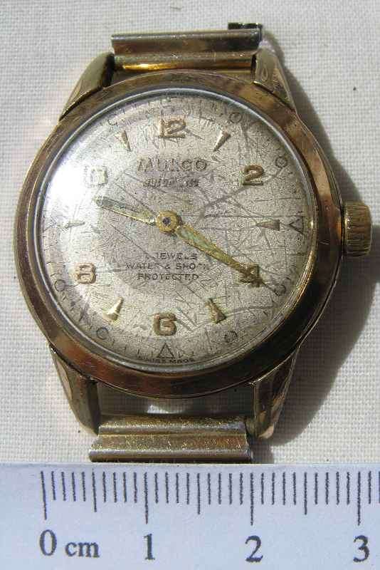 SWISS MULCO AUTOMATIC,7 JEWELS,WATER & SHOCK PROTECTED,ANTIMAGNETIC INCABLOC,STAINLESS STEEL BACK.