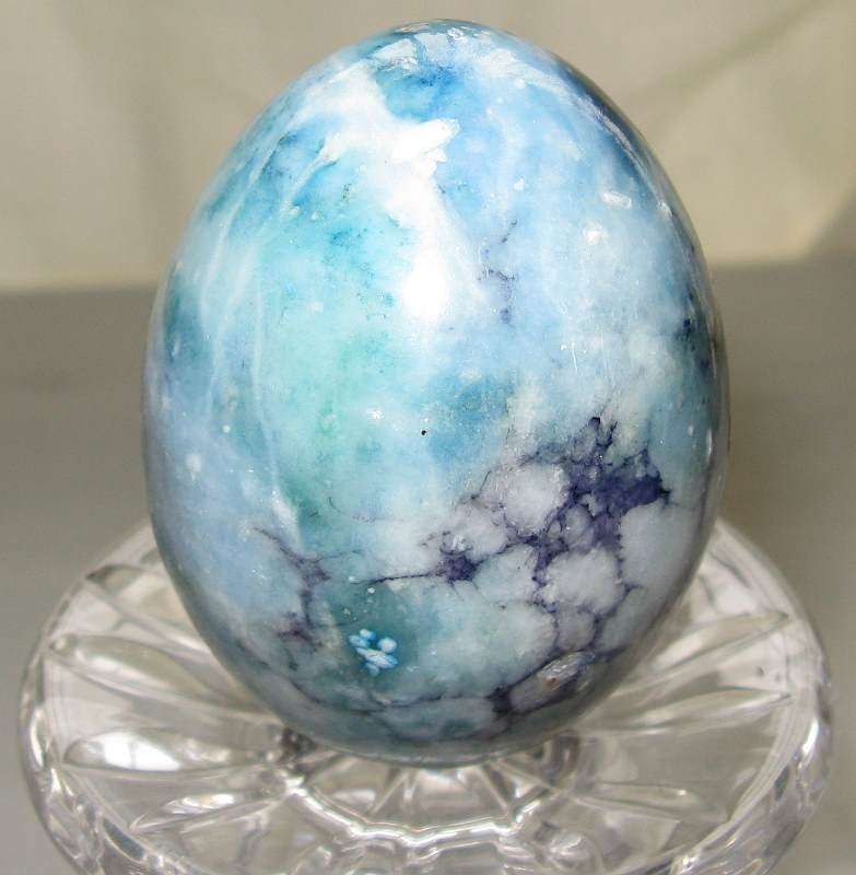 STONE EGG. +/- 145g. Height = +/- 6.5cm x Circumference = 14.5cm.