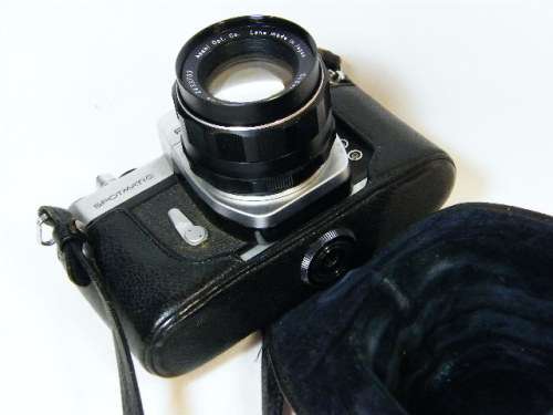 Vintage Asahi Pentax spotmatic 35mm camera with Super-Takumar 1:1,8 55mm lens - some marks on top