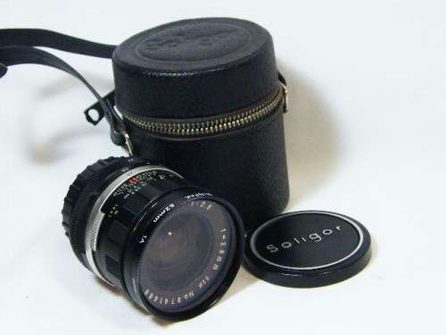 Soligor 1:2.8 28mm lens with pouch - as per photo