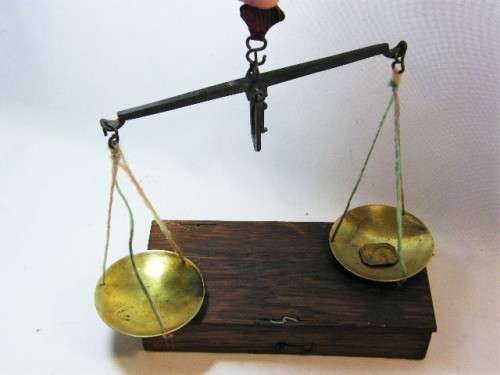Antique brass pocket scale with brass trays in wooden case