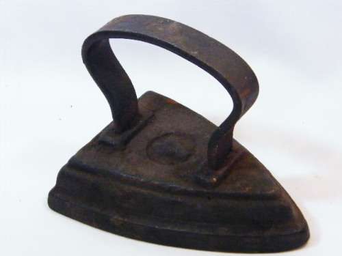 Vintage cast iron No.4 sad iron / door stopper