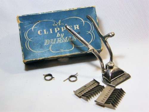 Vintage Burmann manual hair clipper with 2 clipper combs in original box