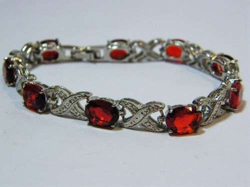 18kt White gold plated fashion jewellery bracelet with red stones