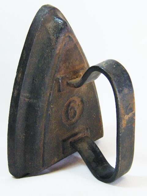 Vintage cast iron No. 6 sad iron / door stopper